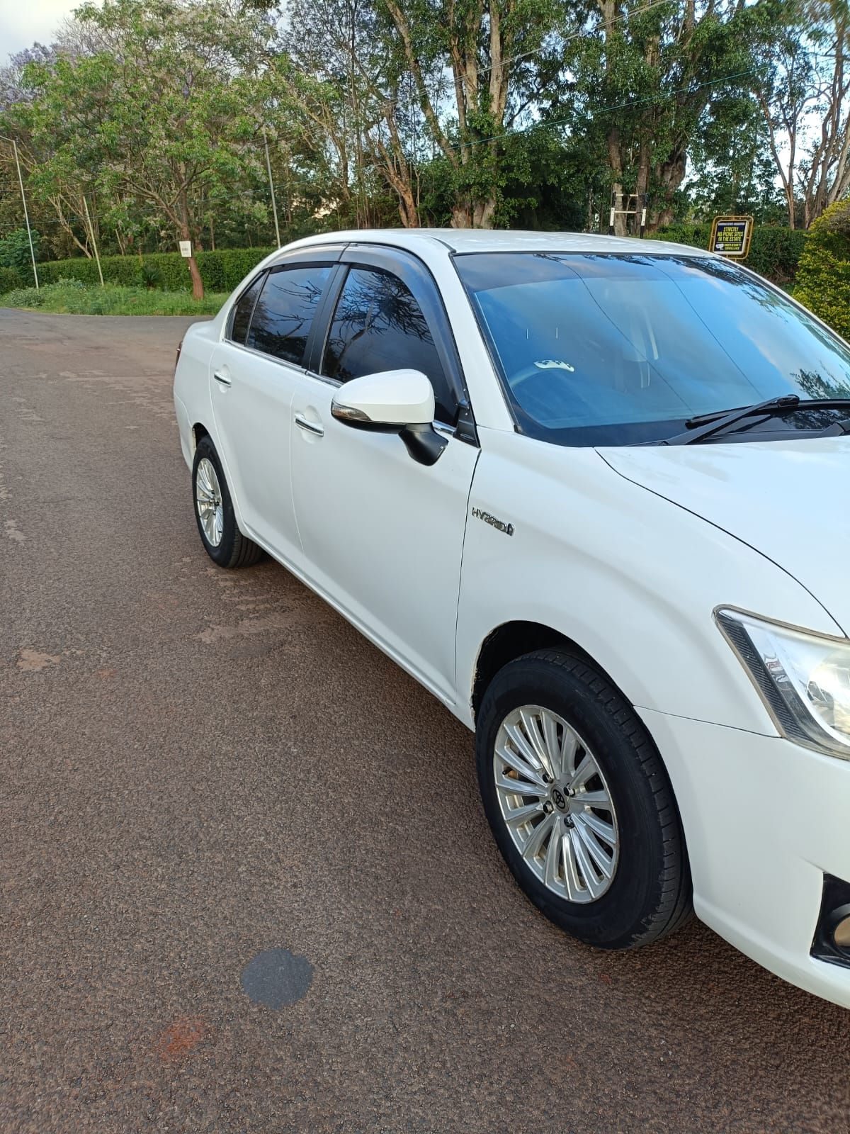 White Axio side profile with alloy wheels