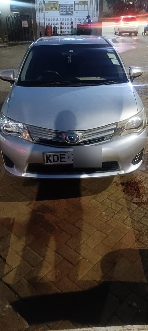 Toyota Corolla Fielder Hybrid — Silver