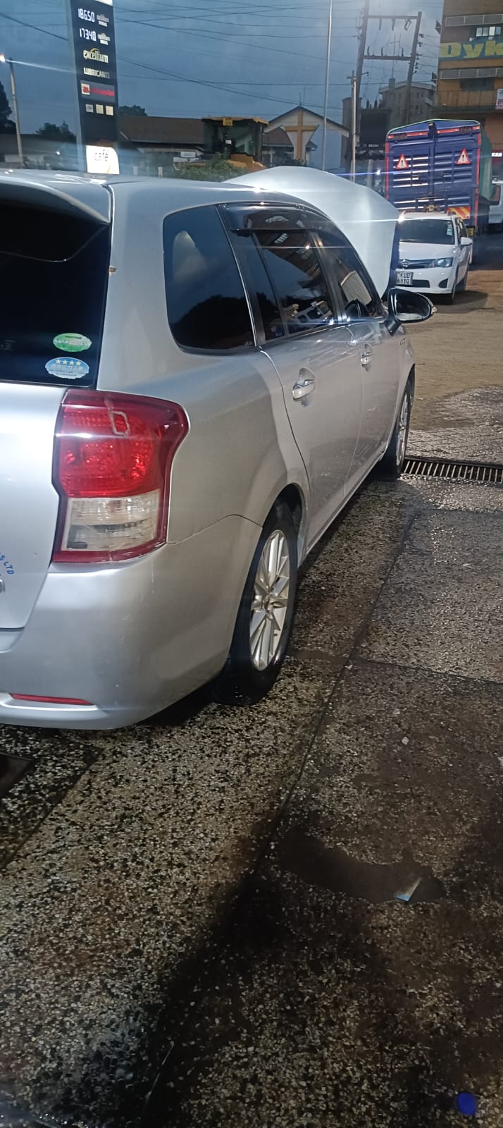 Silver Fielder Hybrid rear-side view